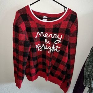 Woman’s long sleeve Christmas sweater. Red and black plaid size MEDIUM (8-10)